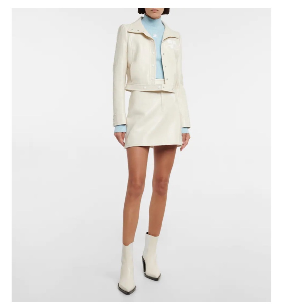 COURRÈGES
Logo ribbed-knit turtleneck sweater